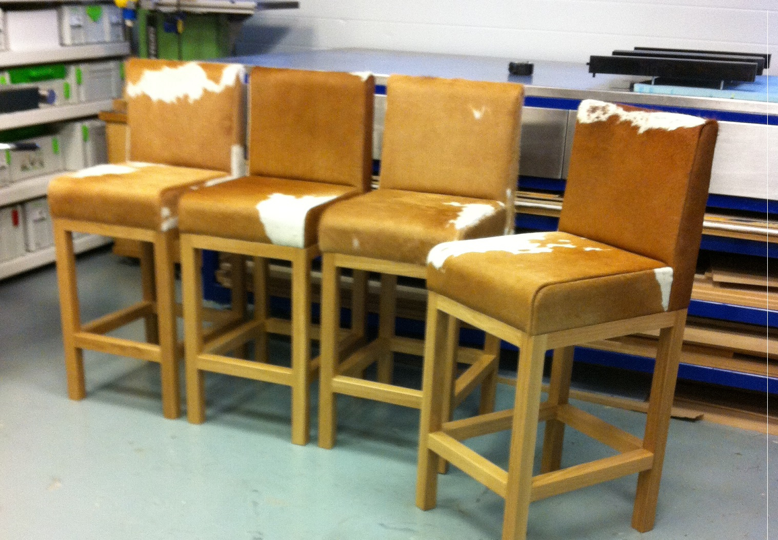 4-tan-cowhide-stools