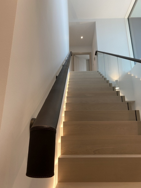 dark brown leather handrail
