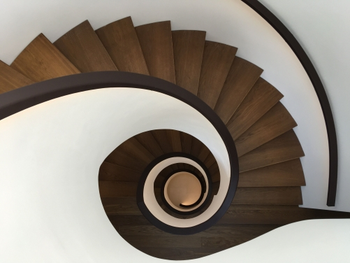 spiral-staircase-leather-handrail