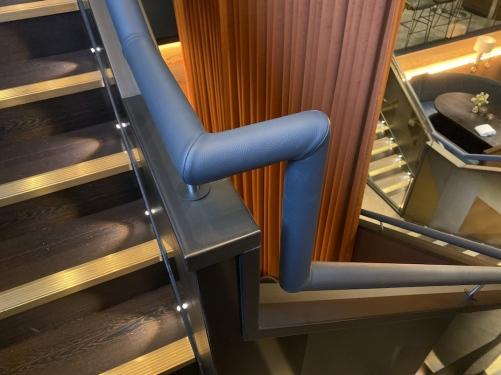 Gaucho Restaurant grey leather handrail