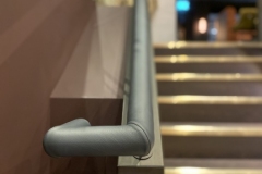 Round grey leather handrail in London Gaucho Restaurant
