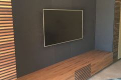 leather wall panels with walnut wood surround