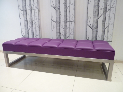 Statement 'purple' leather bench with padded square top design.