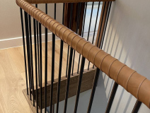 Handrails transformed with a tennis wrap style finish in leather.