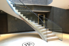 Curved handrails in leather at Buxmead.