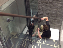 Hand-stitching on leather handrail in Breguet watch store London.