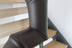 Brown leather handrail with angles