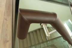 Leather Handrail on glass mounted brackets