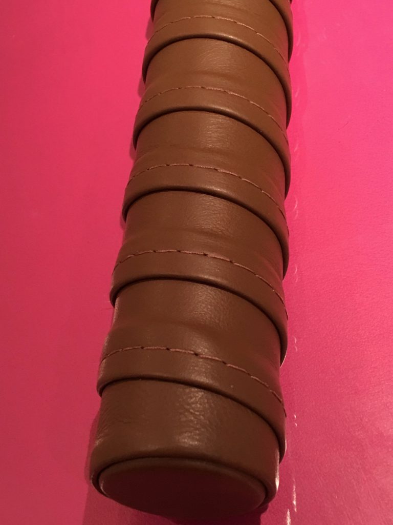 Tennis racket wrap style leather handrail by Hide and Stitch