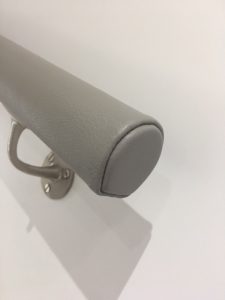 light grey leather handrail