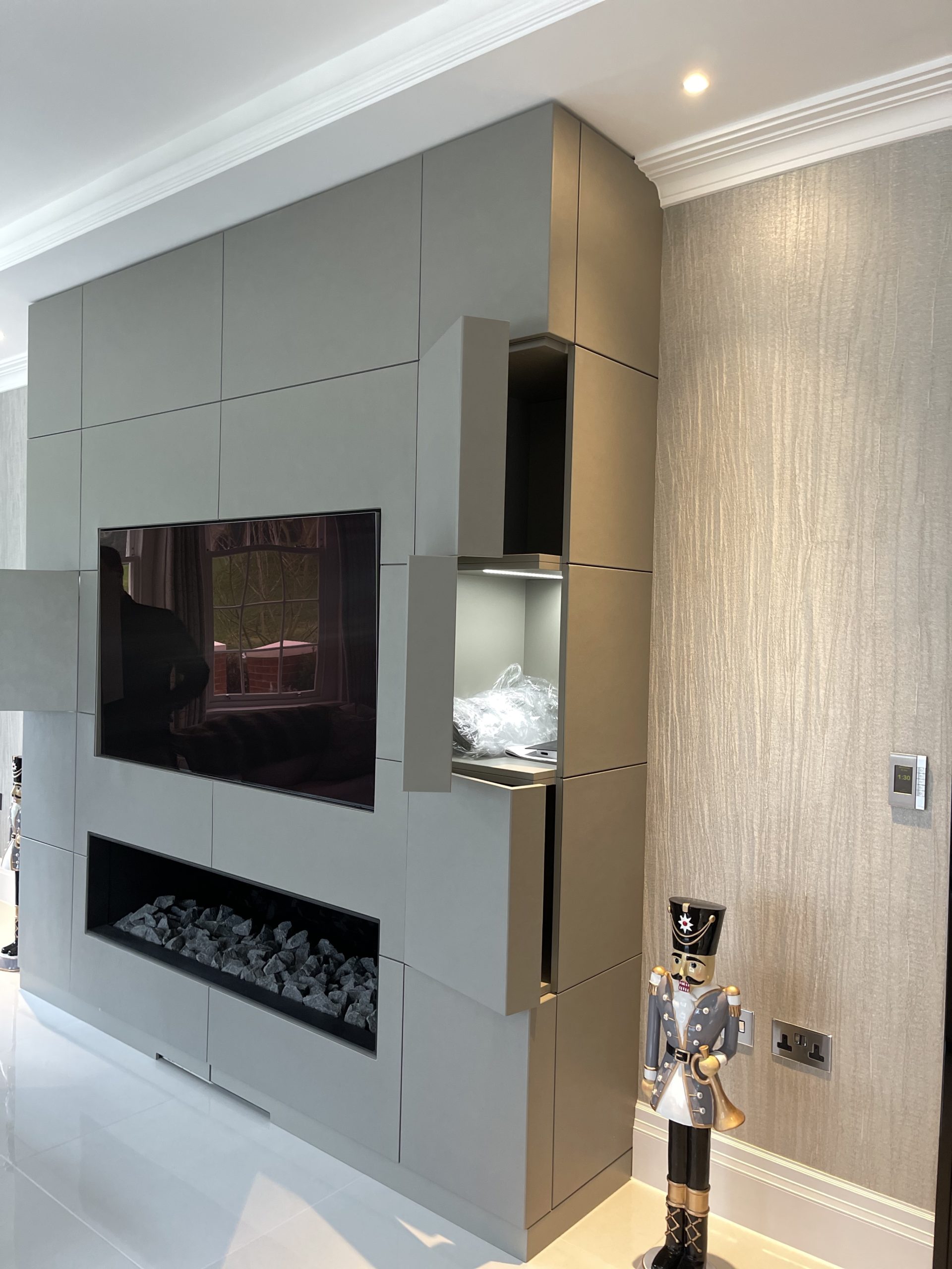 Create a Feature TV Wall in your home Leather panels, builtin storage