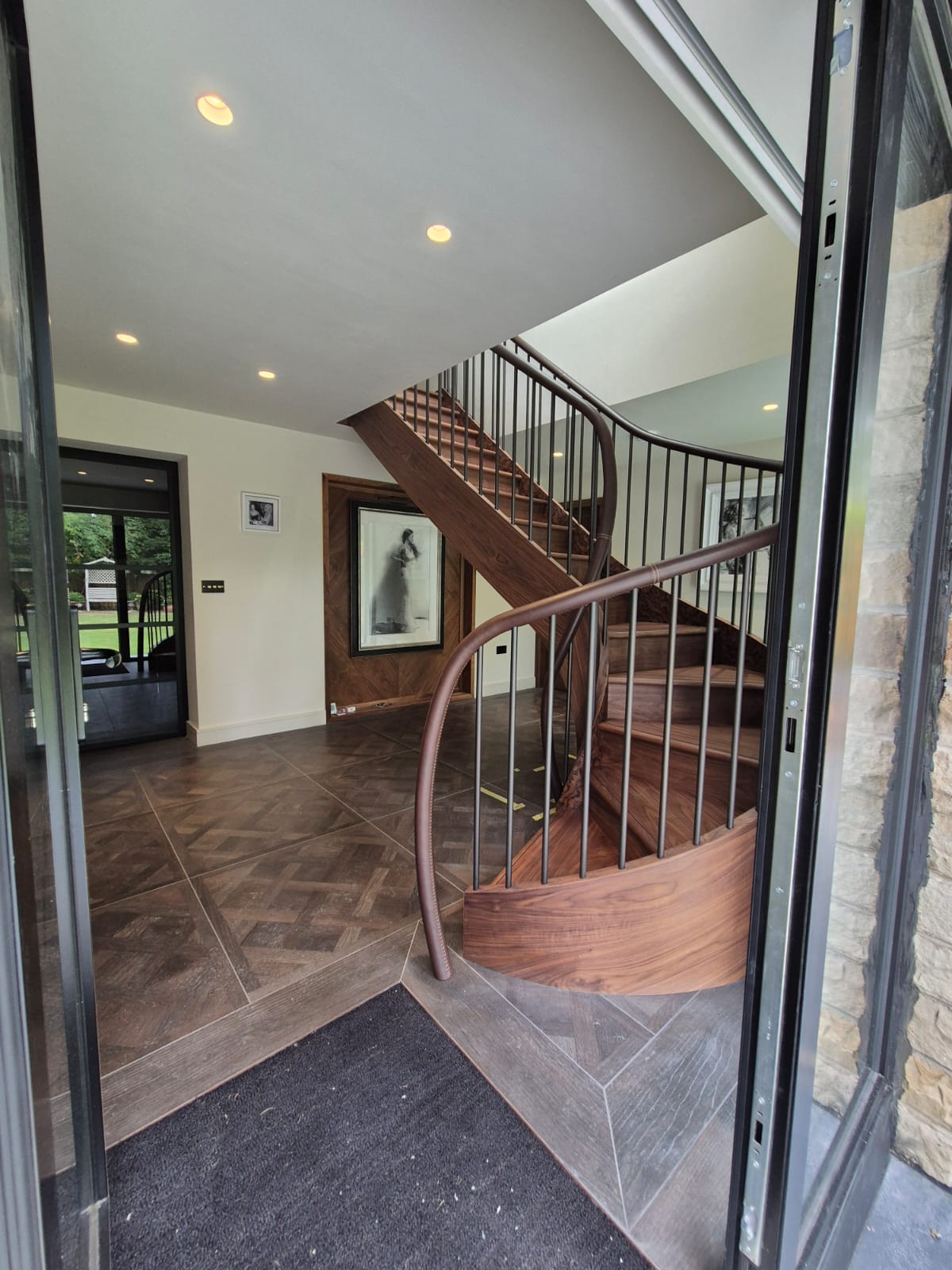 PHOTO-2025-08-09-07-58-22 curving leather handrail